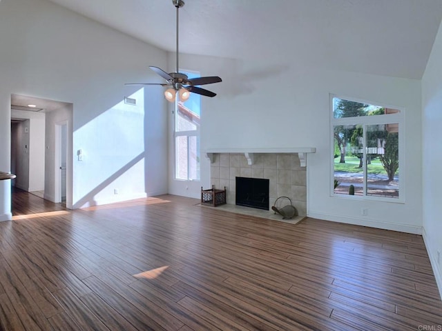 15408 Glentree Rd, Valley Center, CA 92082 - unfurnished living room with wood finished floors, high vaulted ceiling, a fireplace, and ceiling fan