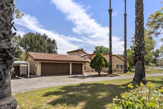 15408 Glentree Rd, Valley Center, CA 92082 - mediterranean / spanish home with a tile roof, stucco siding, concrete driveway, and an attached garage