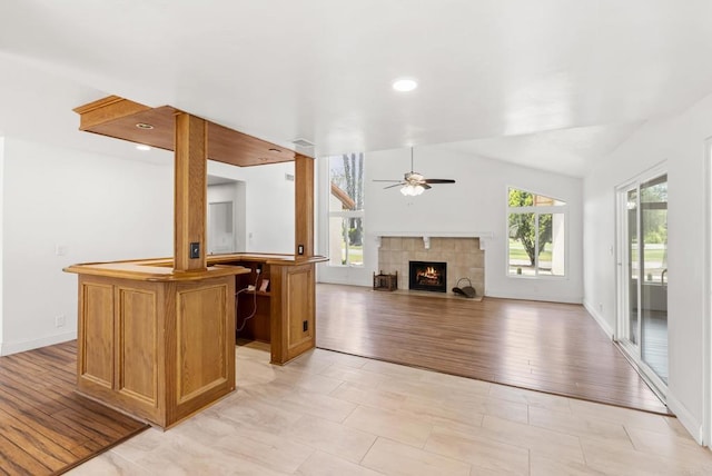 15408 Glentree Rd, Valley Center, CA 92082 - unfurnished living room with plenty of natural light, ceiling fan, a tiled fireplace, light wood-style flooring, and recessed lighting