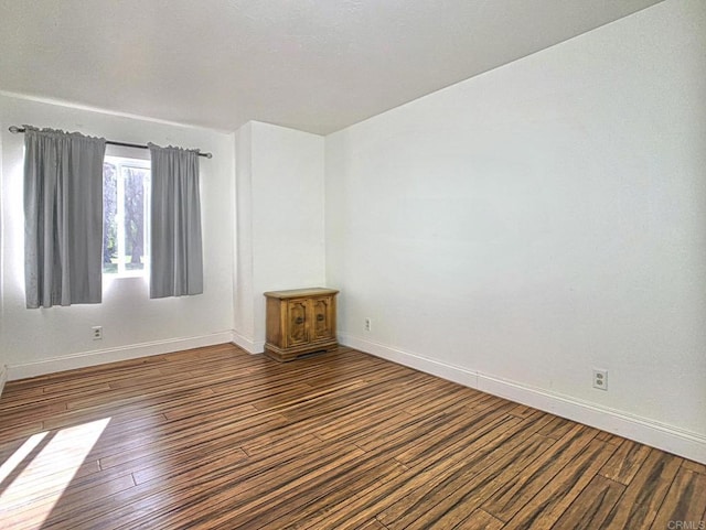15408 Glentree Rd, Valley Center, CA 92082 - empty room featuring wood finished floors and baseboards