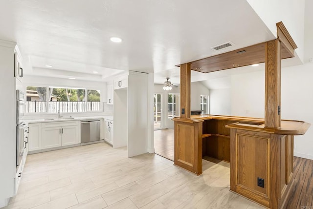15408 Glentree Rd, Valley Center, CA 92082 - kitchen with appliances with stainless steel finishes, a ceiling fan, light countertops, recessed lighting, and white cabinets