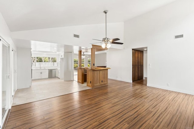15408 Glentree Rd, Valley Center, CA 92082 - unfurnished living room with a ceiling fan, light wood-type flooring, and high vaulted ceiling