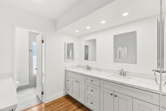 15408 Glentree Rd, Valley Center, CA 92082 - full bathroom featuring double vanity, wood finished floors, and recessed lighting