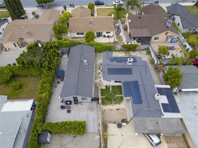 birds eye view of property with a residential view