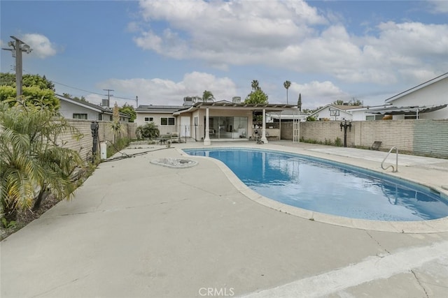 view of pool with a patio, a fenced backyard, and a fenced in pool