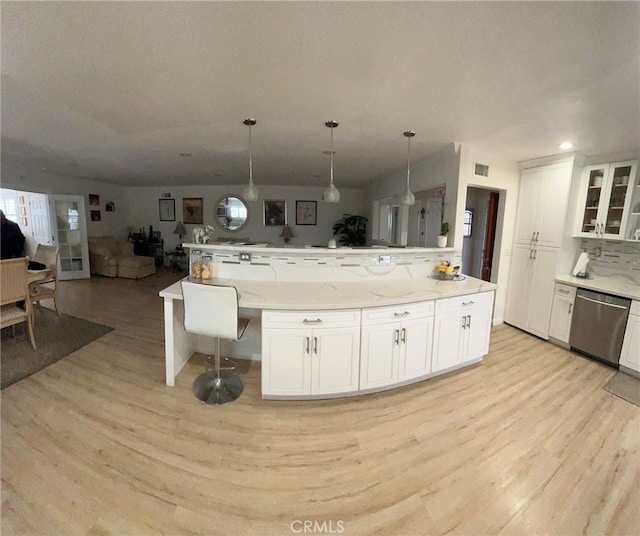19522 Caney Ave, Carson, CA 90746 - kitchen featuring light wood-style floors, open floor plan, tasteful backsplash, and dishwasher