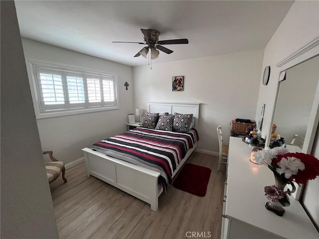 19522 Caney Ave, Carson, CA 90746 - bedroom with light wood-style floors, baseboards, and ceiling fan