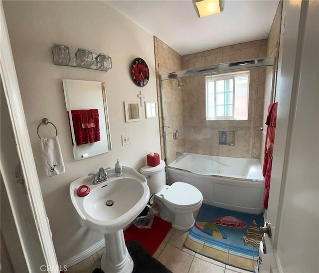 19522 Caney Ave, Carson, CA 90746 - full bath featuring a sink, bath / shower combo with glass door, tile patterned flooring, and toilet