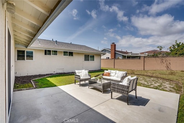 view of patio featuring an outdoor living space and fence