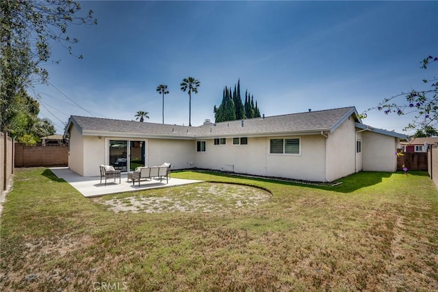 11862 Amethyst, Garden Grove, CA 92845 - rear view of property featuring stucco siding, a fenced backyard, and a patio area