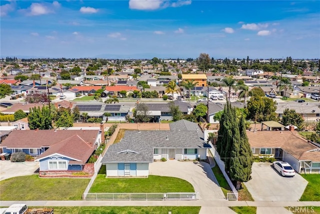 birds eye view of property with a residential view
