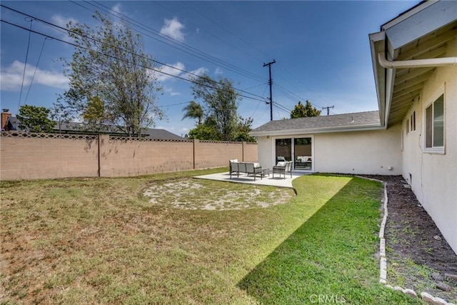 view of yard featuring a fenced backyard and a patio