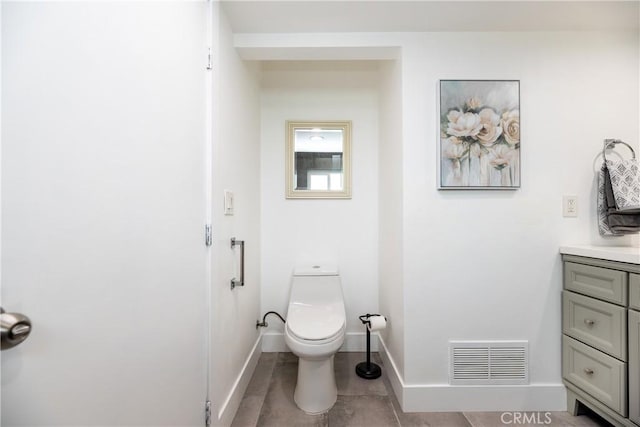 bathroom with visible vents, baseboards, toilet, and vanity