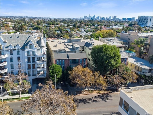 birds eye view of property featuring a view of city