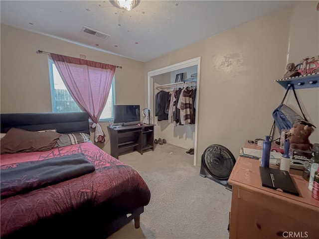 2901 Flint Hills Dr, Bakersfield, CA 93313 - bedroom with visible vents, a closet, and light colored carpet