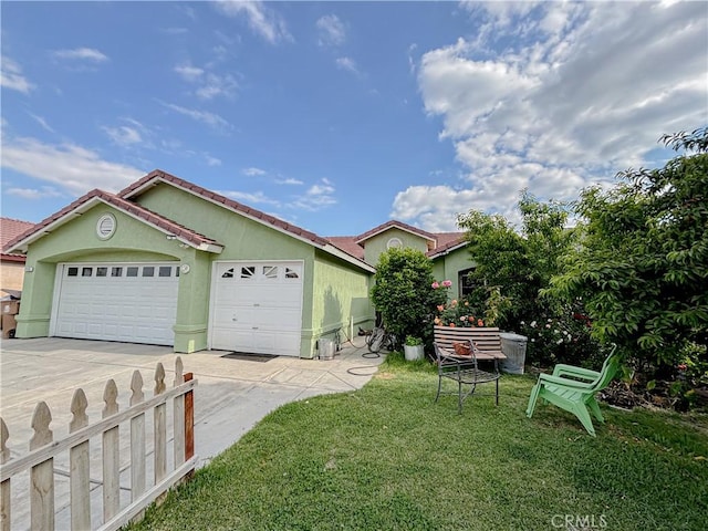 2901 Flint Hills Dr, Bakersfield, CA 93313 - exterior space with an attached garage, stucco siding, a front yard, concrete driveway, and a tiled roof