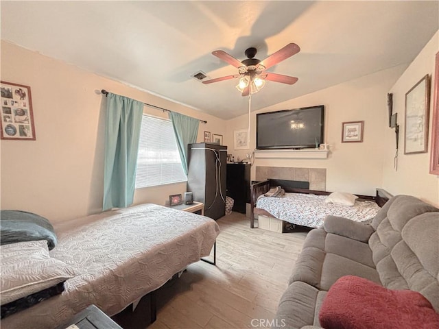 2901 Flint Hills Dr, Bakersfield, CA 93313 - bedroom featuring a ceiling fan, lofted ceiling, wood finished floors, and visible vents