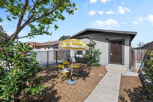 view of front of property featuring a fenced backyard