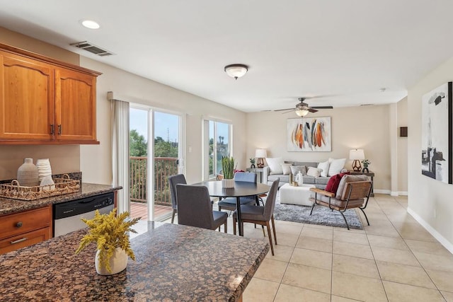 dining room featuring a ceiling fan, visible vents, light tile patterned floors, baseboards, and recessed lighting