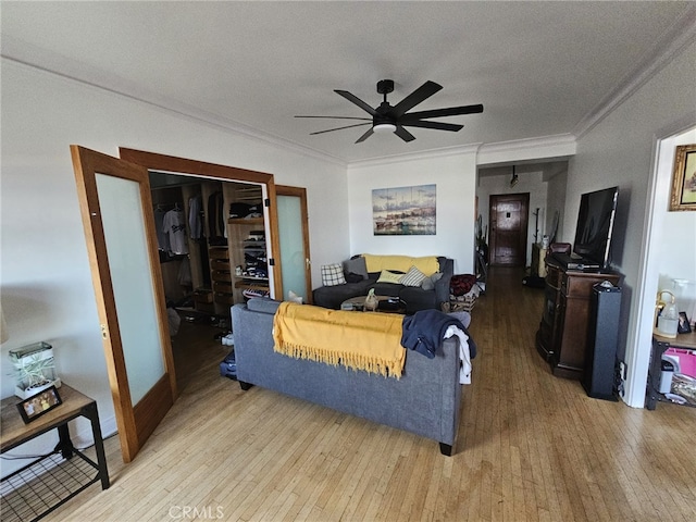 1030 E Ocean Blvd Unit 210, Long Beach, CA 90802 - living room featuring light wood-style flooring, a ceiling fan, ornamental molding, and a textured ceiling
