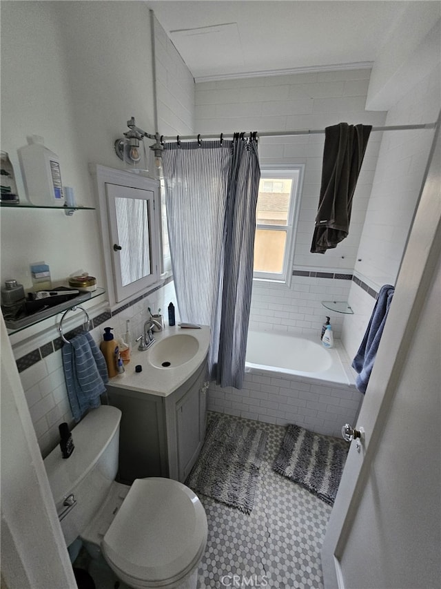 1030 E Ocean Blvd Unit 210, Long Beach, CA 90802 - full bathroom featuring tile walls, tiled shower / bath, vanity, and tile patterned floors
