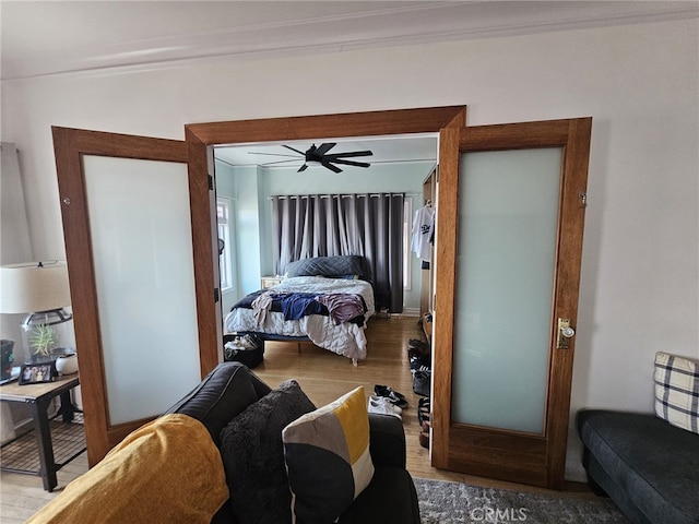 1030 E Ocean Blvd Unit 210, Long Beach, CA 90802 - bedroom with wood finished floors and ornamental molding