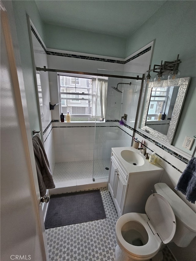 1030 E Ocean Blvd Unit 210, Long Beach, CA 90802 - bathroom featuring a shower stall, vanity, and tile patterned floors