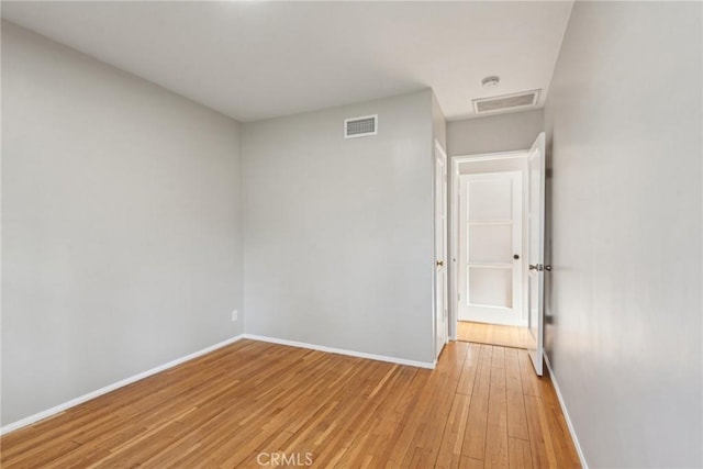 17048 Baltar St, Lake Balboa, CA 91406 - empty room with visible vents, light wood finished floors, and baseboards