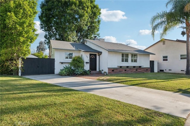 single story home featuring a gate, stucco siding, concrete driveway, and a front yard