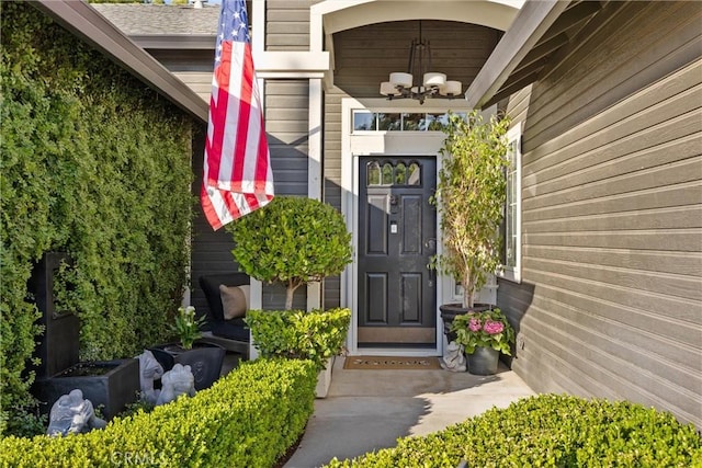 entrance to property featuring a porch