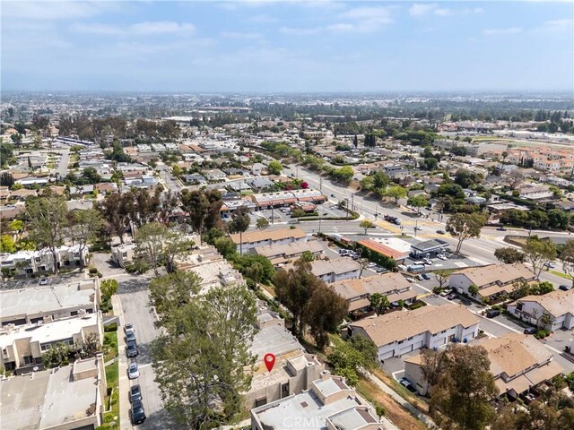 aerial overview of property's location with nearby suburban area