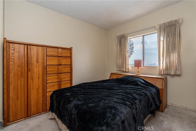 bedroom with light carpet