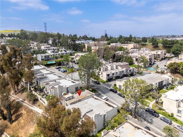aerial view of property's location featuring nearby suburban area