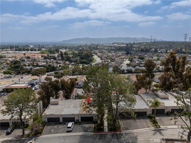 aerial view of residential area with a mountainous background