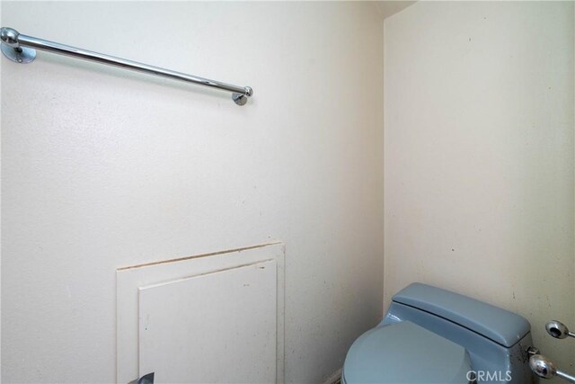 bathroom featuring toilet