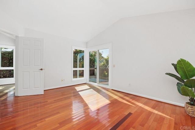 814 Okra Ct, Carlsbad, CA 92011 - empty room featuring lofted ceiling and wood finished floors