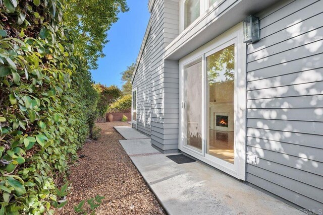 814 Okra Ct, Carlsbad, CA 92011 - view of exterior entry featuring a patio area