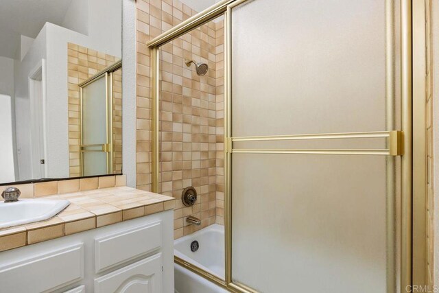 814 Okra Ct, Carlsbad, CA 92011 - bathroom featuring combined bath / shower with glass door and vanity