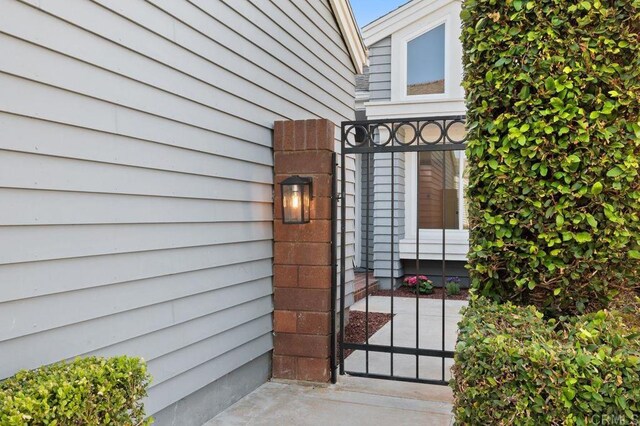 814 Okra Ct, Carlsbad, CA 92011 - doorway to property featuring a gate