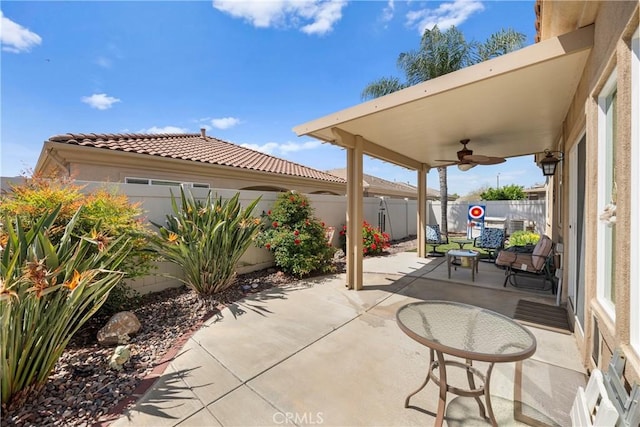 5551 Corte Fiesta, Hemet, CA 92545 - fenced backyard featuring a patio and a ceiling fan