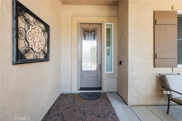 5551 Corte Fiesta, Hemet, CA 92545 - doorway to property featuring stucco siding
