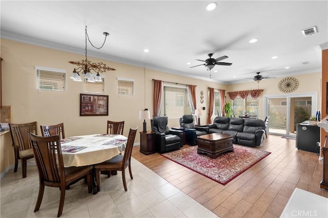 5551 Corte Fiesta, Hemet, CA 92545 - dining area featuring recessed lighting, crown molding, a ceiling fan, and a chandelier
