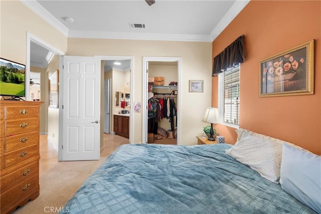 5551 Corte Fiesta, Hemet, CA 92545 - bedroom featuring ornamental molding, a walk in closet, a closet, and light colored carpet