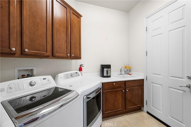 5551 Corte Fiesta, Hemet, CA 92545 - laundry area with washing machine and clothes dryer, cabinet space, and light tile patterned floors