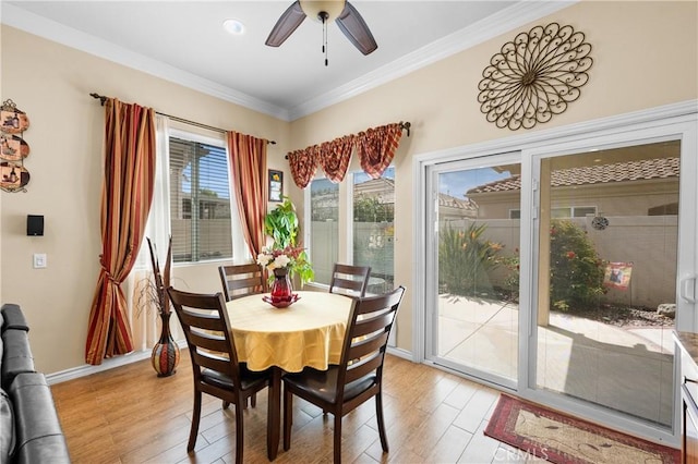 5551 Corte Fiesta, Hemet, CA 92545 - dining area with light wood finished floors, a ceiling fan, and crown molding