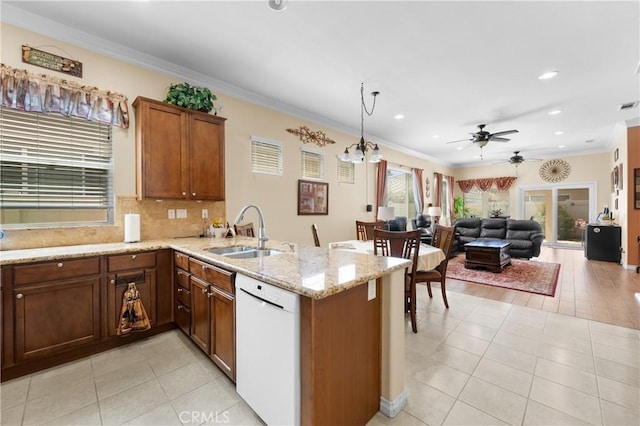 5551 Corte Fiesta, Hemet, CA 92545 - kitchen with dishwasher, light tile patterned floors, a peninsula, ceiling fan, and ornamental molding