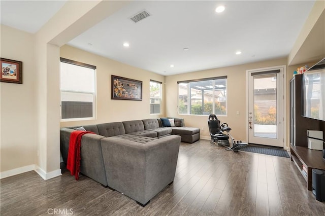 2677 E Tyler St, Long Beach, CA 90810 - living room with dark wood-style flooring, baseboards, visible vents, and recessed lighting