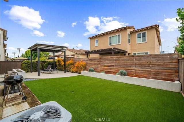 2677 E Tyler St, Long Beach, CA 90810 - view of yard featuring central air condition unit, a patio, and a fenced backyard