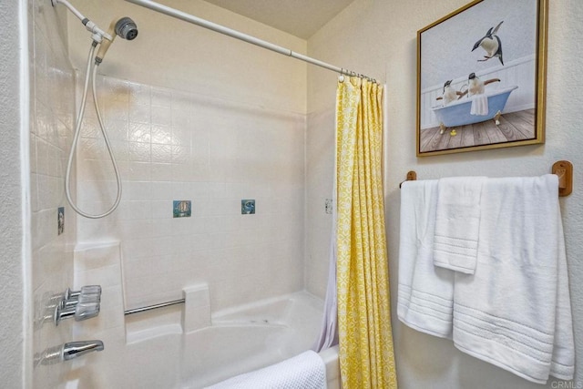 full bathroom with shower / bath combo with shower curtain