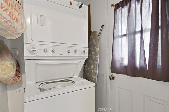 159 E 105th St, Los Angeles, CA 90003 - laundry area with stacked washer / drying machine